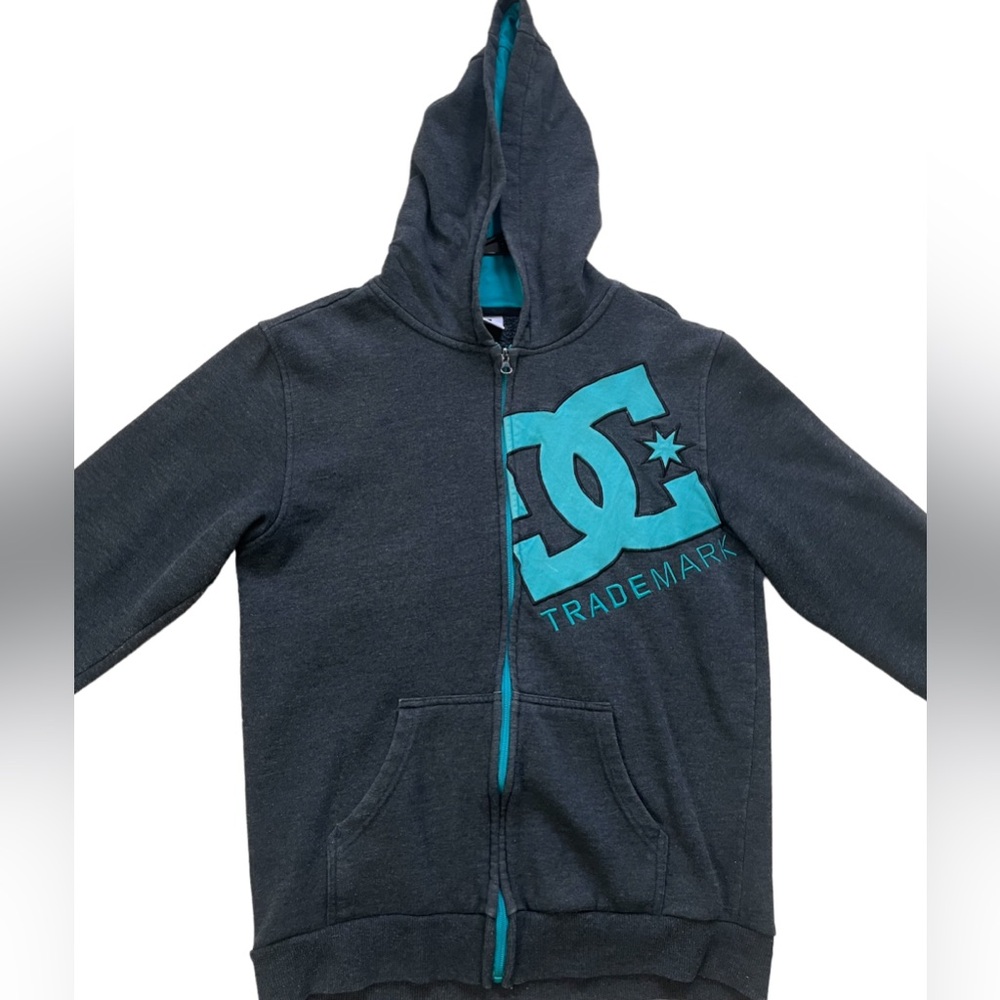 DC trademark zip up